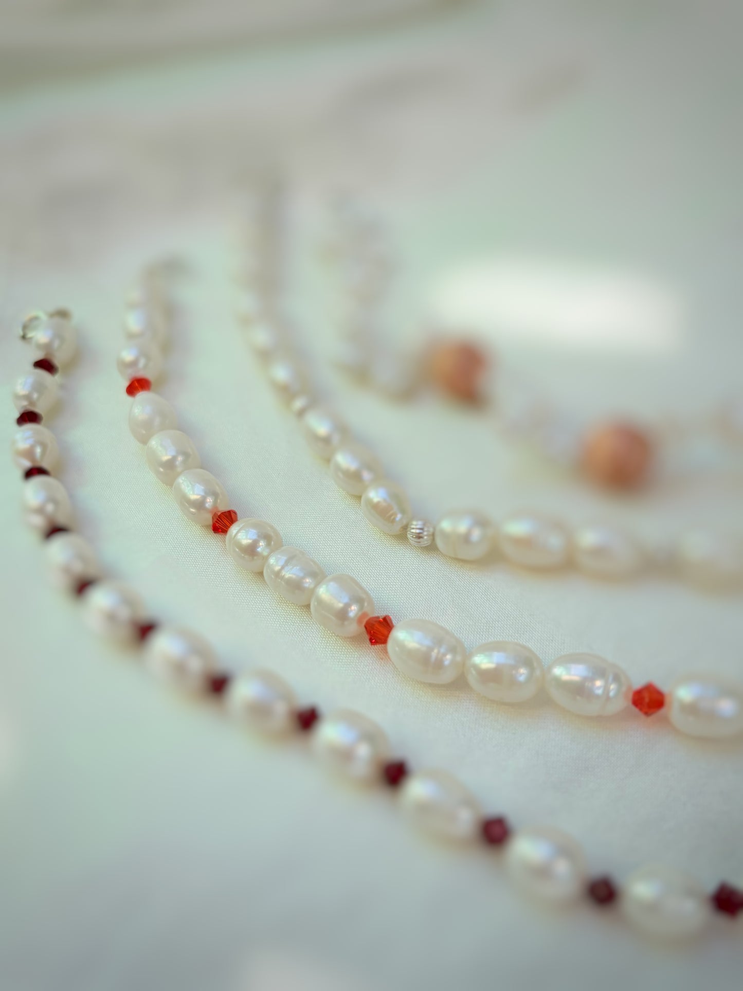 PULSERA NUDO NÁCAR/ SWAROVSKI NARANJOS