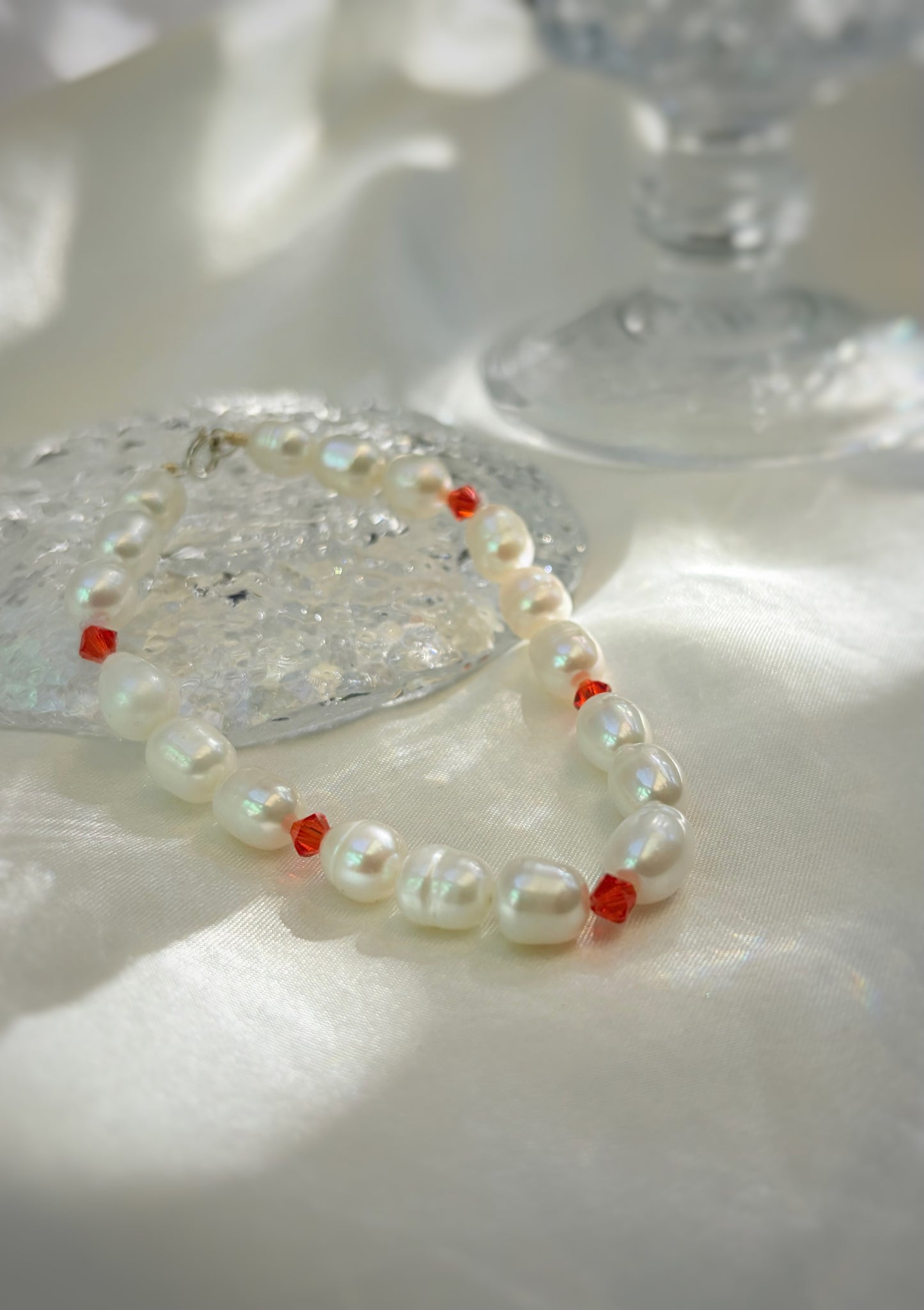 PULSERA NUDO NÁCAR/ SWAROVSKI NARANJOS