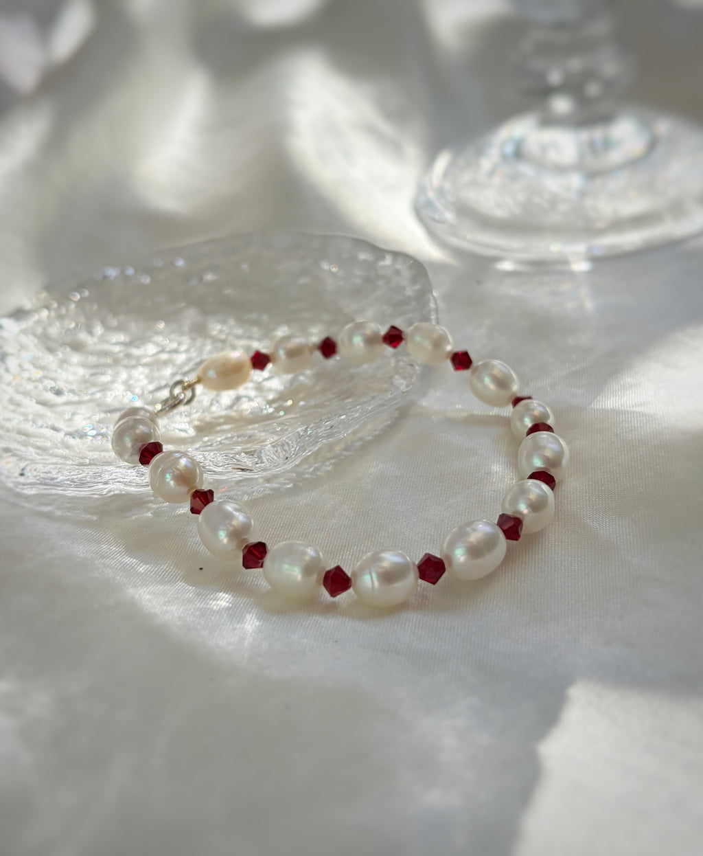 PULSERA NUDO NÁCAR/ SWAROVSKI BURDEOS